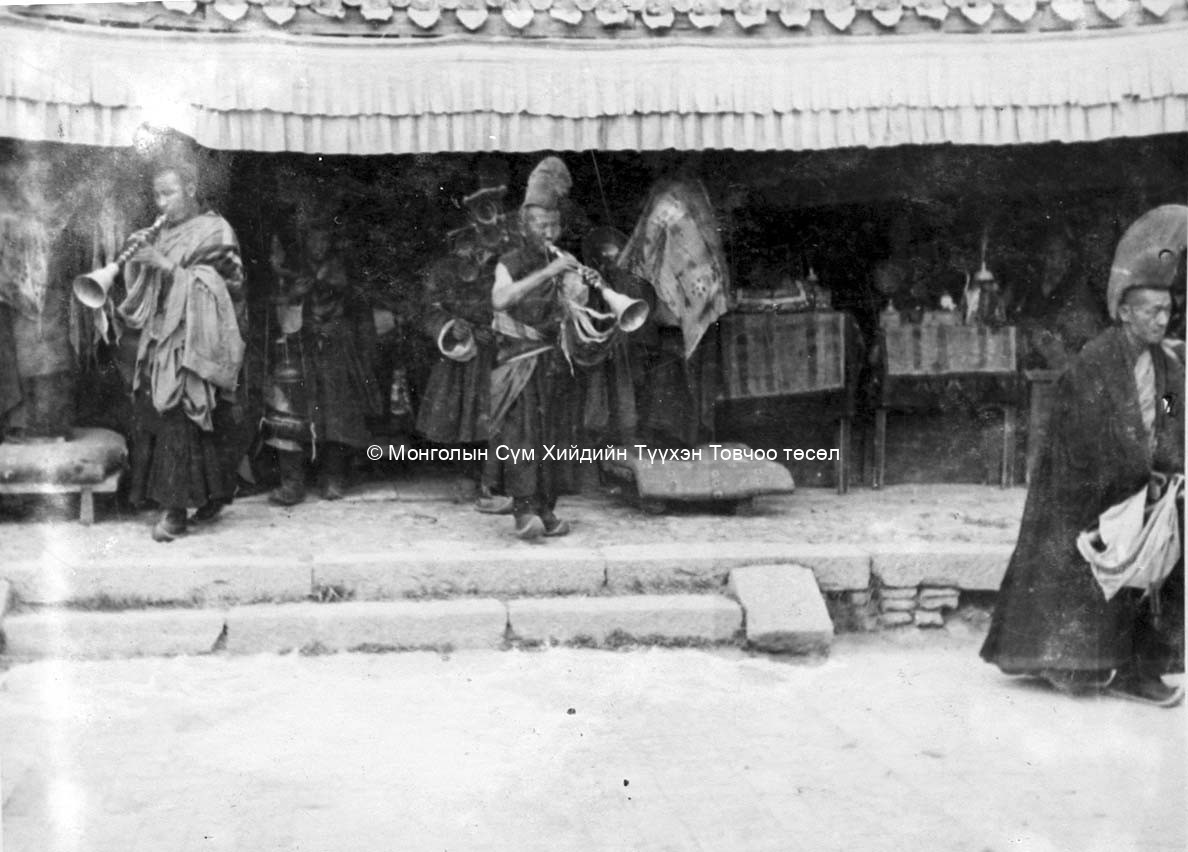 Start of the Tsam dance, two monks with bishgüür. DSCN0407